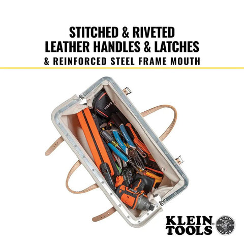 Top view of Heavy Duty Natural Canvas Tool Bag With Wide Hinged Opening, leather handles, tools inside.