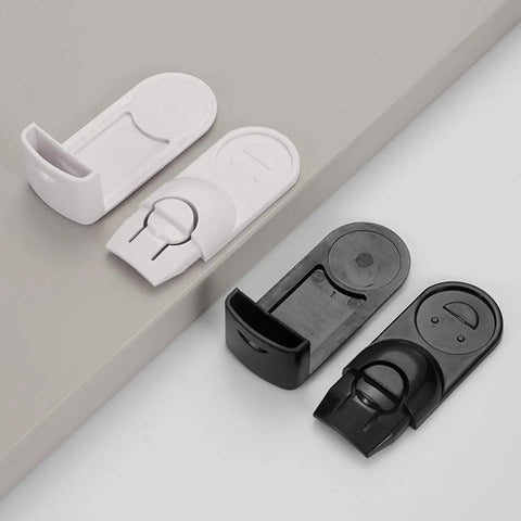 4 Pack Kid Safe Cabinet Locks Peel And Stick Drawer Latches No Drill Child Proof Clips in white and black on a gray background.