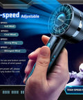Hand holding 2 Pack Portable Handheld Turbo Fan With 7000rpm High Speed Motor USB Rechargeable with 4 speed settings