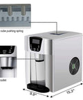 Zero Drama Automatic Countertop Ice Machine Cranking Out Fresh Clear Cubes At Nine Point Five Kilograms Daily With Food Grade Abs Body And Sleek Brushed Metal Finish showing controls and ice outlet.