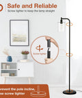 Illustration of Modern Black Floor Lamp with Seeded Glass Shade showing assembly in a living room, emphasizing safety and tightening.