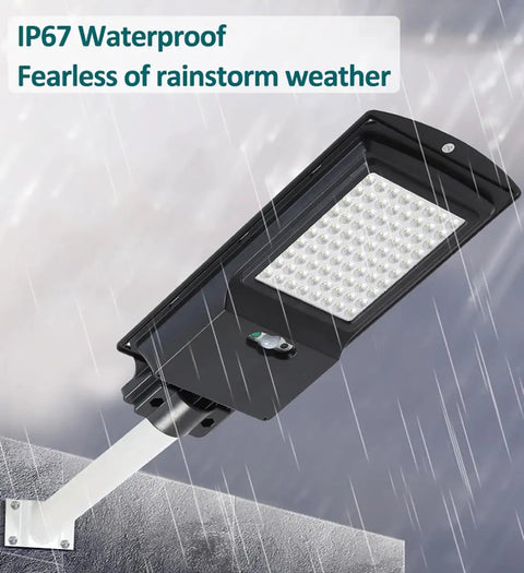 JUDYSSY 360W Solar Street Lights Outdoor, Dusk to Dawn Solar Waterproof Security Flood Lights Motion Sensor LED in rain.