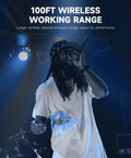 Performer on stage with Wireless XLR Microphone Transmitter And Receiver Kit For Pro Gigs 2.4GHz Plug-On Wireless Mic Adapter.
