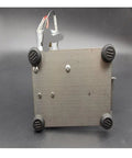 Back view of Compact Mini Electric Belt Sander And Multifunctional Desktop Grinder, showcasing metal base and motor connections.