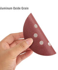Hand holding 5 Inch 8-Hole Sanding Disc Set With Hook And Loop Includes Grits 60 80 100 120 180 240 320 400 For Random Orbital Sander