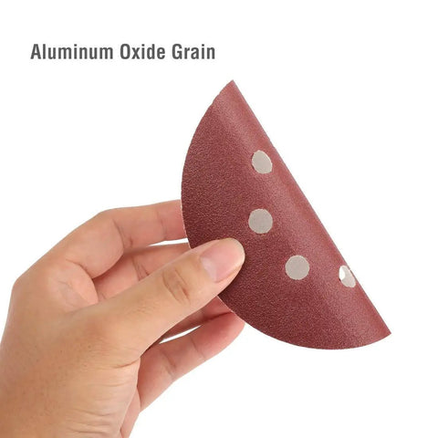 Hand holding 5 Inch 8-Hole Sanding Disc Set With Hook And Loop Includes Grits 60 80 100 120 180 240 320 400 For Random Orbital Sander