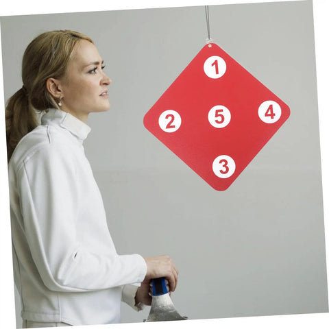Fencer facing a red Multi Purpose Fencing Target For Indoor Practice with numbered zones and suspension.