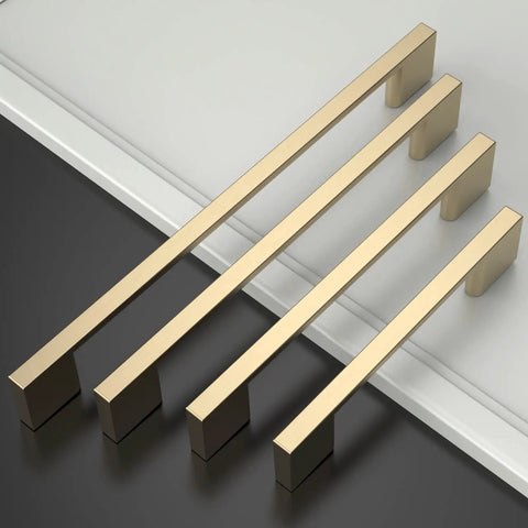Top Tier Ten Inch Brushed Brass Cabinet Handles And Sturdy Long Drawer Pulls 10 Pack on a white surface.