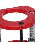 Heavy Duty Aluminum Router Lift Base With Two Jaw Clamping And Smooth Top Adjust Crank close-up showing red finish and adjustment screws.