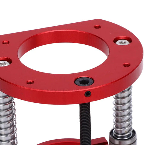 Heavy Duty Aluminum Router Lift Base With Two Jaw Clamping And Smooth Top Adjust Crank close-up showing red finish and adjustment screws.