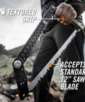 Folding Camp Saw With 12 Inch Blade For Backpacking, Hiking, Camping And Bushcraft, close-up of textured grip and blade near fire.