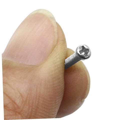 Hella Solid Mini Screw Kit For Eyeglass And Laptop Repair Packs Durable self-tapping screw held between fingers for easy repairs.