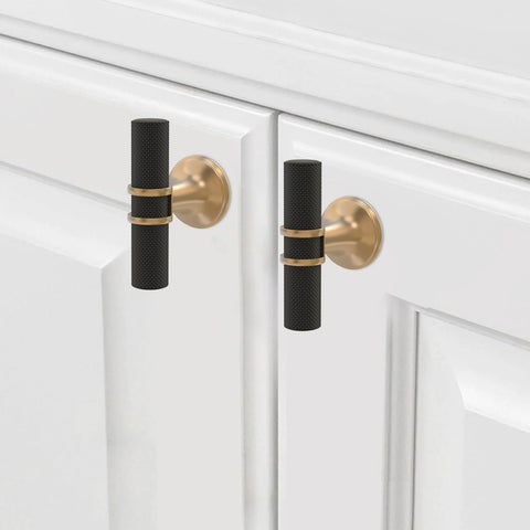 10 Pack Matte Black and Champagne Bronze Knurled Cabinet Knobs installed on white cabinet doors