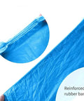 Close-up of 200 Packs Disposable Non Slip Shoe Covers Game Changer Thick Nonwoven Durable Booties With Elastic Edges shown stretched.