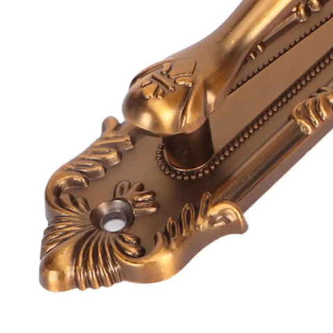 Close-up of Beefy Heavy Duty Antique Barn Door Handle Set Double Sided Pull For Sliding Barn Doors with rustic carved design and backplate.