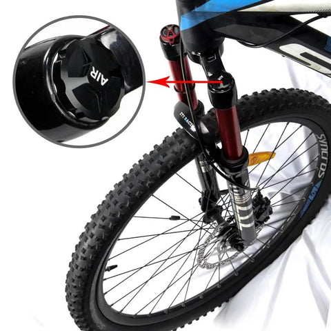 Close-up of CNC Aluminum Mountain Bike Fork Cap Protector Black for Front Suspension Upgrade Lightweight Yet Tough Valve Cover Shield
