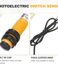 Close-up of Workhorse M18 Diffuse Reflection Photoelectric Sensor with 10 CM detection range, PNP NO output, showing wiring.