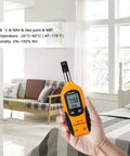Handy All In One Digital Hygrometer And Psychrometer With Dew Point And Wet Bulb Readouts in a hand, room background