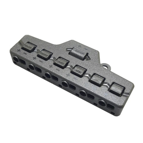 Slick One To Six LED Strip Light Connector Block With No Sweat Wire Splitter For Low Voltage Power Distribution and tight automotive or marine rig installations, gray plastic design.