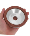 Diamond Cup Grinding Wheel Perfect For Metal And Stone Sharpening Tasks held in hand for easy demonstration of size and design.