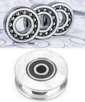 Heavy Duty Snatch Block Pulley For Wire Rope Lifting, Deep U Double Bearing Wheel Block With Smooth Operation And Load-Lightening Performance, Available In 28mm Or 56mm Diameter Options For Safer, Easier Rigging And Lifting. silver double-bearing pulley wheel for wire rope lifting, shown with round metal bearing