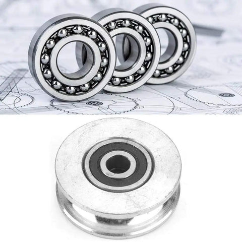 Heavy Duty Snatch Block Pulley For Wire Rope Lifting, Deep U Double Bearing Wheel Block With Smooth Operation And Load-Lightening Performance, Available In 28mm Or 56mm Diameter Options For Safer, Easier Rigging And Lifting. silver double-bearing pulley wheel for wire rope lifting, shown with round metal bearing