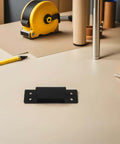 Concealed Adjustable 5 Inch Wood Door Hinge Black Square Hidden Cabinet Hinge For Secret Doors on a table with tools