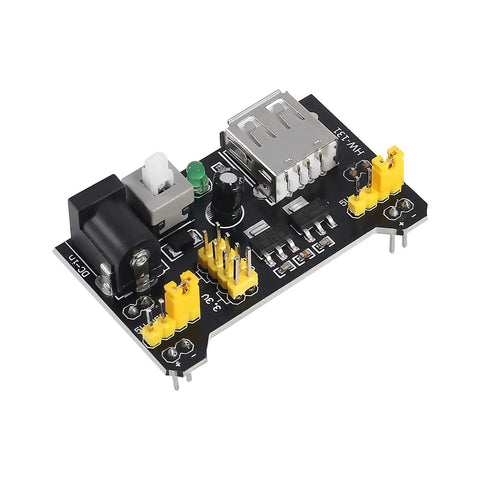 Power supply module from Awesome Breadboard Kit With Power Supply Module And 830 Point And 400 Point Solderless Boards 130 Piece Flexible Jumper Wires 9V Battery Clips T Type For Raspberry Pi And DIY Electronics Projects, showing connectors and ports.