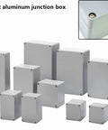 Front view of cast aluminum IP66 waterproof junction boxes in multiple sizes; gray outdoor enclosures