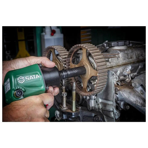 Mechanic using Beefy Deep Thin Wall One Half Inch Drive Metric Impact Socket Set 13 Piece to work on gears.