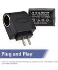 Plug Right Into Your Wall With This Beefy AC To DC Power Converter Transformer Steps Down 220V Household Juice To 12V Cigarette Lighter Socket For Powering Car Vacuums Coolers And Tire Inflators Hassle Free Anywhere You Roam. Close-up of black AC to DC adapter with plug and socket, suitable for 220V usage.