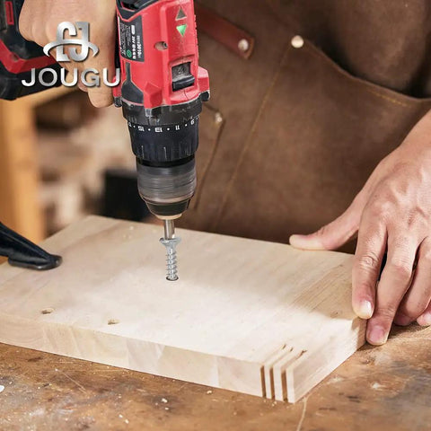 Heavy Duty Wood Screws With Torx Star Drive Heads And Countersunk Points For Quick Deck Builds Plus Hella Rock Solid Grip On Lumber Projects Includes Two Hundred Galvanized Steel Fasteners In A Compact Carry Bag That Never Strips Or Backs Out Early, being installed with a drill on wood.