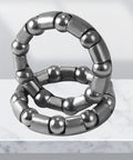 Close-up of stainless steel caged bearings from Bicycle Headset Bearings Kit 4 Pack, 5 By 32 Inch, 16 Ball, Pro Grade Replacement Parts.