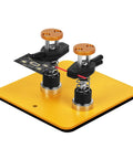 Magnetic Helping Hands Clamp Dual Head Soldering Holder for Small Electronics and PCB Repair on yellow base, top view.