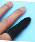 1000 Pack Antistatic Finger Cots Providing A No Sweat Grip That Shields Precise Electronics During Heavy Mechanic Work And Warehouse Tasks While Delivering Knockout Quality On A Tight Budget, shown in use on a finger.