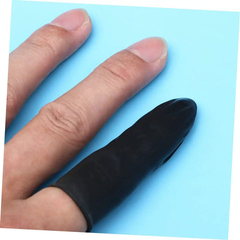 1000 Pack Antistatic Finger Cots Providing A No Sweat Grip That Shields Precise Electronics During Heavy Mechanic Work And Warehouse Tasks While Delivering Knockout Quality On A Tight Budget, shown in use on a finger.