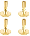Four brass-colored metal lamp switch knobs for standard light sockets