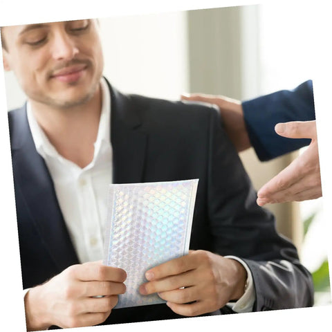 Person holding Colorful Bubble Mailers Set 20 Pcs 15x20cm Waterproof Padded Envelopes With Self Sealing Adhesive Shockproof Packing Bags.