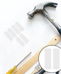 Double Headed Furniture Clips 100 Pack Adjustable Nut Design Nylon Connectors next to tools for DIY cabinet assembly.