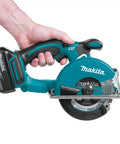 Game Changing 18V LXT Cordless Metal Cutter Shreds Steel Sheets Pipes Square Tubing And Unistrut 3600 RPM held in hand.