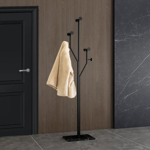 Heavy-Duty Freestanding Coat Rack With Tree-Shaped Metal Design And Marble Base in hallway, holding a coat, black, 68.9 inches tall