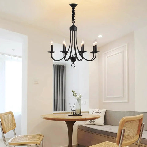 Black 8 Light Farmhouse Chandelier With Easy Installation For Dining Room And Kitchen Over Table Rustic Pendant Ceiling Light With E12 Base Ideal For Bedroom And Hallway Decor hanging above dining table.