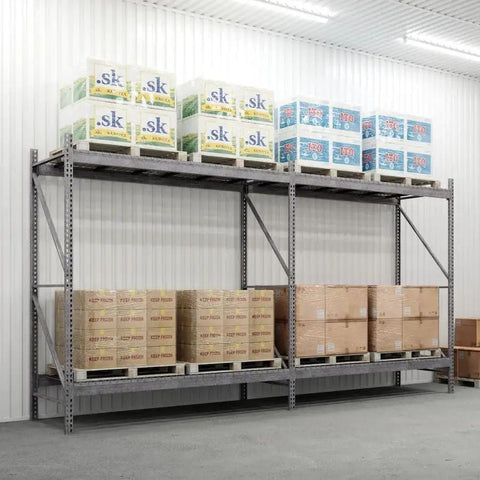 Built Tough 48X144X120 Inch Two Tier Galvanized Teardrop Pallet Rack Add On with stored boxes in a cold storage setting.