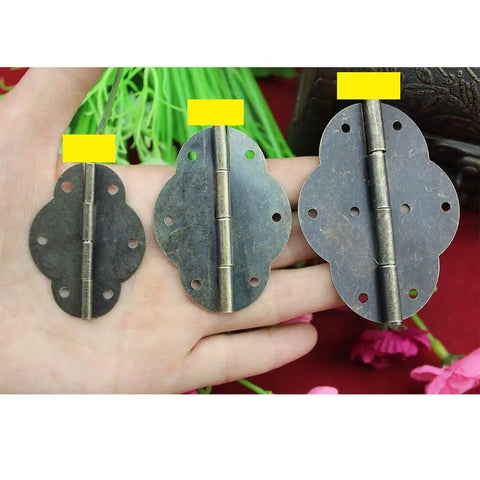 Two Pack Bronze Cabinet Hinges With Screws For Doors And Wood Boxes, Sturdy Bronze Finish, Easy Install Butt Hinge Set shown on hand