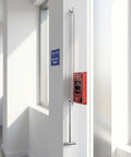 3 Pack Emergency Glass Breaker Hammers For Fire Alarm Call Points In Commercial Buildings, displayed in a hallway.