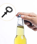 Hand using Heavy Duty Zinc Alloy Screw In Bottle Opener on a glass bottle, showcasing the matte black threaded design.