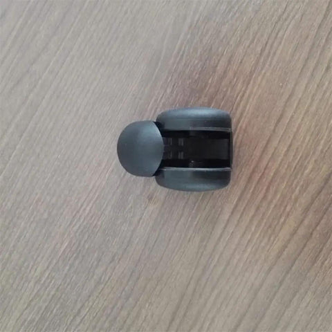 Slick Black Twin Wheel Swivel Casters With M10 Threaded Stem view from above, showing 2-inch dual wheel design for smooth chair use.