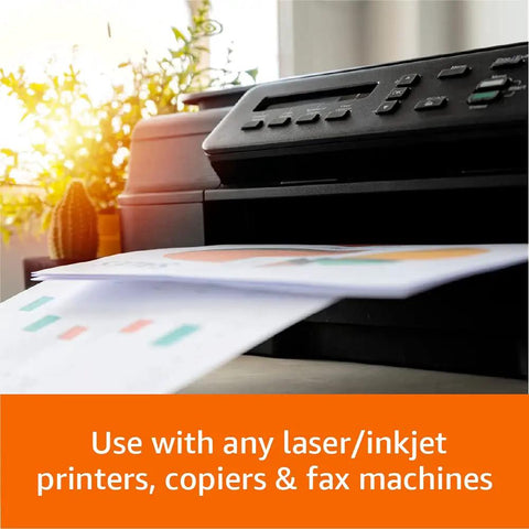 Top Notch Multipurpose Copy Paper 20 Lb 11 X 17 Inches Tabloid Size printing from a laser printer in a bright office.