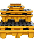 Stacked spill containment pallet tray platform for oil drums concrete tanks and paint buckets in garage and industrial settings.