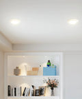 Bulk 24 Count 5 By 6 Inch Led Disk Lights With Smart Dimming Controls For Seamless Flush Mount Ceiling Disc Swap Featuring Crisp Warm White Glow And No Sweat Setup On Any Old Recessed Housing illuminating a modern room.